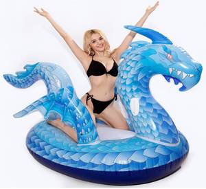 lot 42706 image: Giant Inflatable Dragon Pool Float, Cool ice Dragon raft 9 Feet Long with Faster Valve, Pool Float Floatie Ride On Summer Beach Pool Party Lounge for Kids and Adults (Dragon Float) Retail $35
