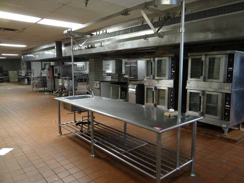 lot 1262 image: Stainless Steel Chefs Work Station With Pot Rack And Sink (Located In Kitchen)