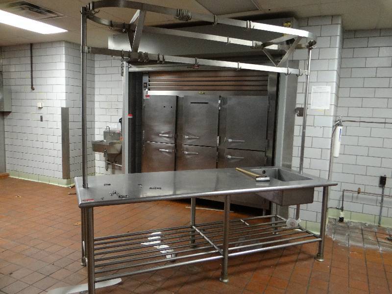 lot 1284 image: Stainless Steel Chefs Work Station With Pot Rack And Sink(Located In Kitchen)