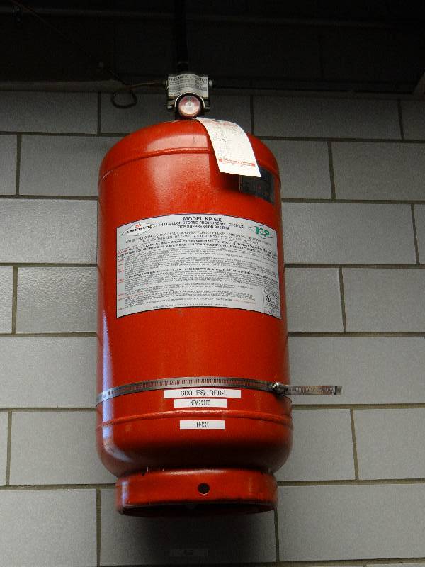 lot 1289 image: Amerex KP 600 6.1 Gallon Pressurized Fire Suppression Tank With Acutator (Located In Kitchen)