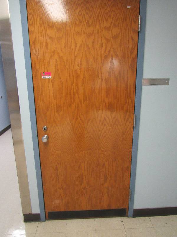 lot 1690 image: (10) Wooden Doors With Frame In Physical Therapy