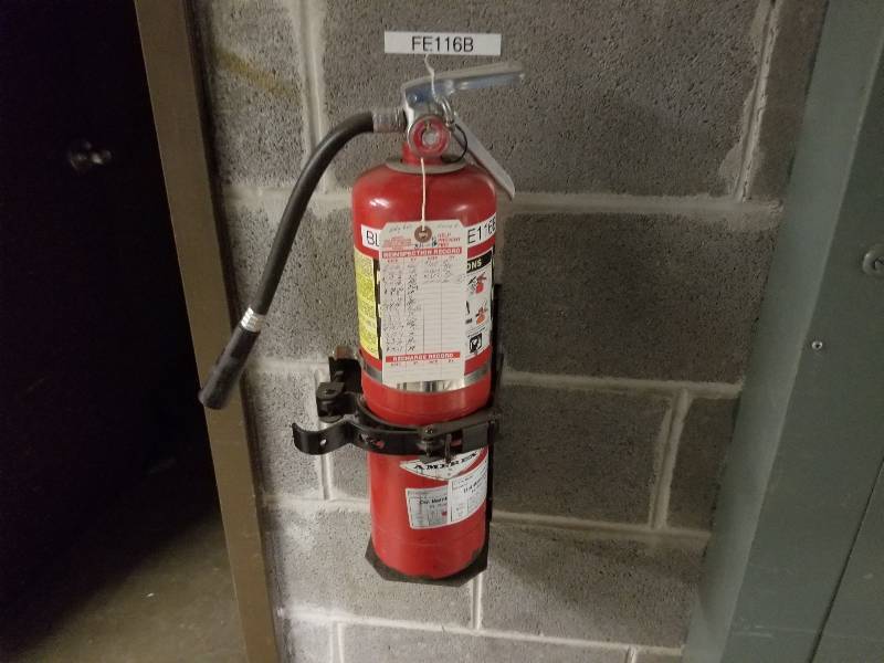 lot 1177 image: Red wall mount fire extinguisher