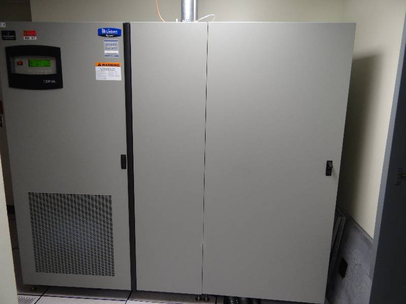 lot 1879 image: Emerson Network Power Uninterruptible Power Supply Model Npower SN37-8490 And 37MB1000AC62P