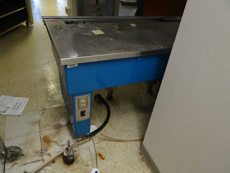 lot 1319 image: Stainless Top Buffet Style Table With Drains For Soda Fountain