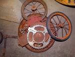 Old trike wheels & industrial pieces.