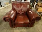 Over size club chair w/nail head trim - burgundy bounded leather.