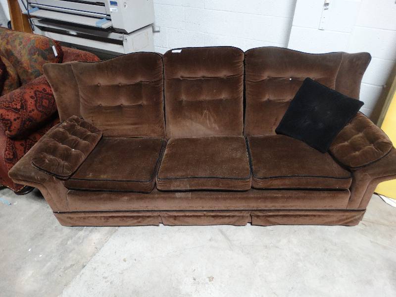 lot 106 image: Brown Velvet Sofa wBlack trim.