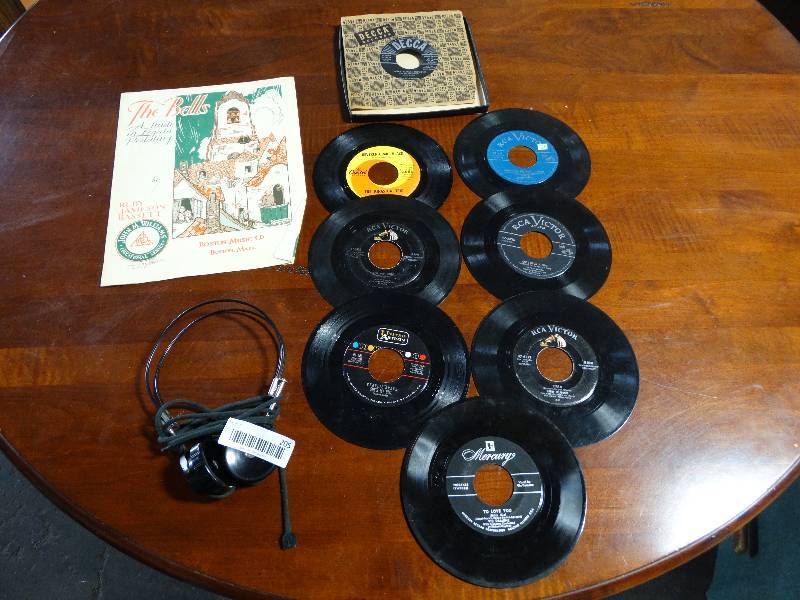 lot 205 image: Lot of Vintage 45 rpm Records, Sheet Music, & Vintage Headphones.