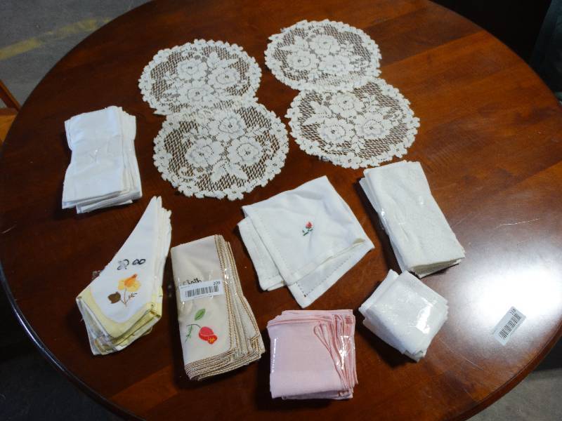 lot 209 image: Large Lot of Vintatge Doilies & Cloth Napkins.