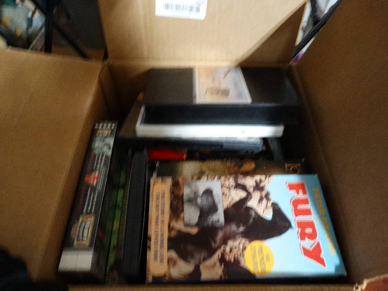 lot 267 image: Box of DVDVHS Movies.