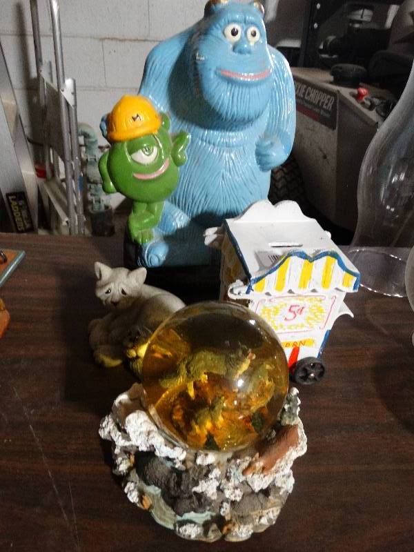 lot 270 image: Decor Items - Iron Bank, Monsters Inc. Bank.