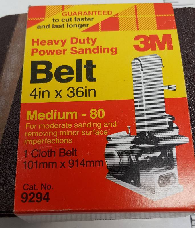 lot 7075 image: One belt slightly used and the other is new in the package