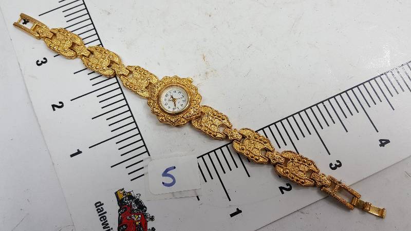 lot 5393-5 image: This watch is from a collection picked up at a Storage Locker Wars auction.  None have been tested