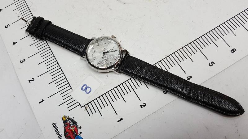 lot 5393-8 image: This watch is from a collection picked up at a Storage Locker Wars auction.  None have been tested