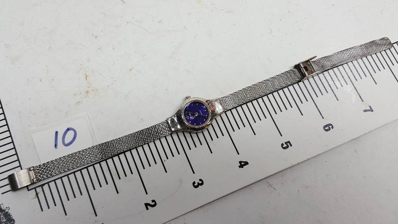 lot 5393-10 image: This watch is from a collection picked up at a Storage Locker Wars auction.  None have been tested