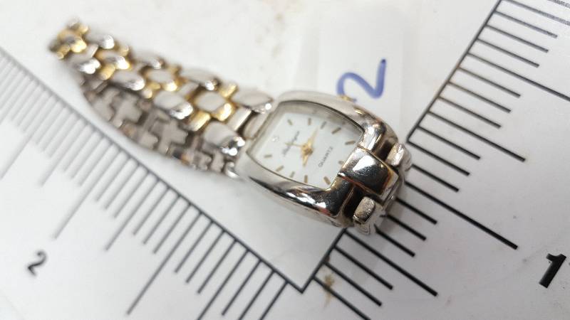 lot 5393-2 image: This watch is from a collection picked up at a Storage Locker Wars auction.  None have been tested