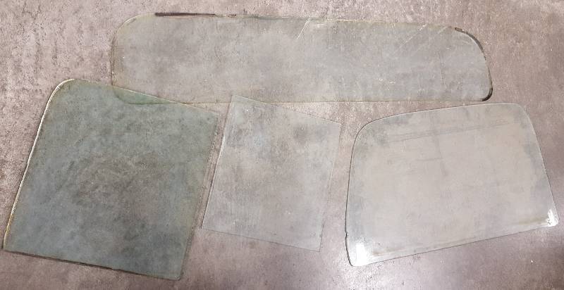 lot 5404 image: He had 30s Ford passenger cars and trucks and thinks the windshield was out of one of them.
