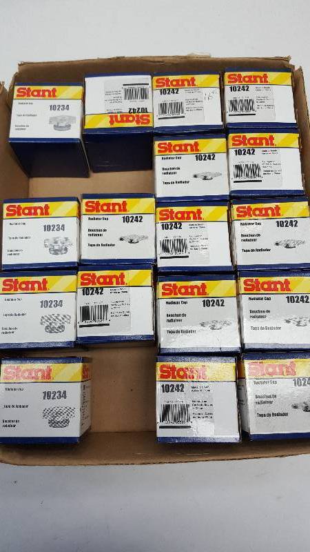 lot 5634 image: Another Tray full of new in the boxes Stant Radiator and coolant caps