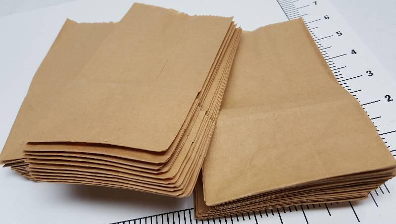 lot 5296 image: 50 new brown paper sacks that measure 3-12 X 6 and with the square bottom when opened.