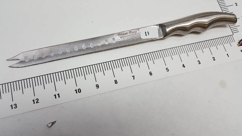 lot 5640-11 image: Get sharp on your cooking with this kitchen utensil.  Wash it and use it