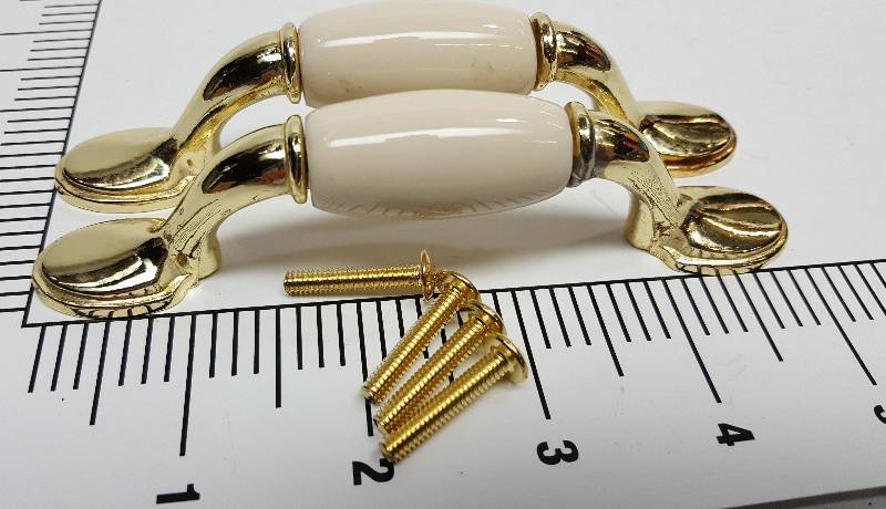 lot 5352 image: New pair of the Bone and Brass drawer pulls with mounting hardware and on 3 centers