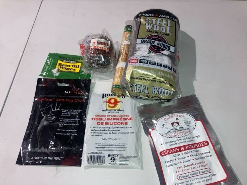 lot 32935 image: HUNTING CARE PACKAGE, REM OIL WIPES, FOGKLEAR ANTI FOG CLOTH, HOPPES 9 THE GUNCARE, METAL POLISHING CLOTHES, STEEL WOOL GRADE #0000, METAL GUN CLEANING PAD STANLESS, QUIKWOOD