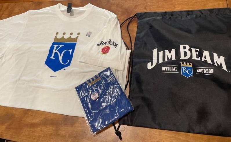lot 39204 image: Kansas City Royals Official Sporting Wear Gift Package- One KC Royals T-Shirt - One Bandanna - One Black Draw String Bag All items Endorsement Jim Beam (Shirt Size Large)