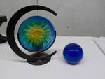 sun candle holder and blue glass ball