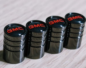 lot 2101 image: GMC Valve Stem Covers