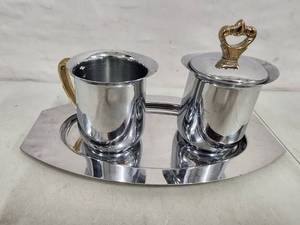 lot 2003 image: Vintage Kromex Stainless Steel Covered Sugar Bowl and Creamer with Tray