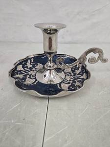 lot 2040 image: Hand held candle holder made in India with blue glaze bottom floral designs