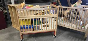 lot 12380 image: Child Crib Contents