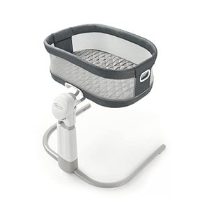 lot 63895 image: Graco DreamMore Bedside Bassinet Deluxe with Calming Motion - Retail $279.08