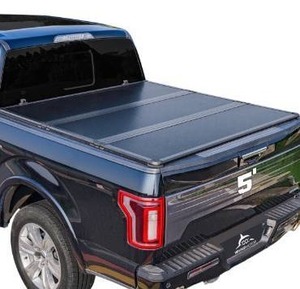 lot 63779 image: Hard Folding Truck Bed Tonneau Cover Compatible with Toyota Tacoma 2016-2024 5 ft Short Box - Retail $489.99