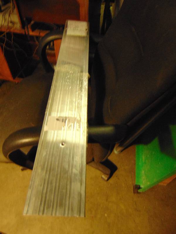 lot 1044 image: (1) Aluminum Threshold 36-12 x 5