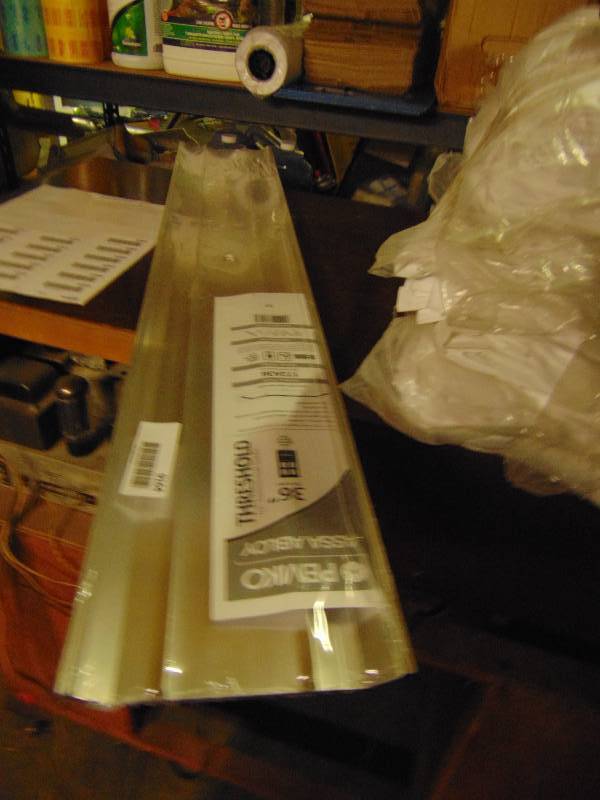 lot 1045 image: (1) Aluminum Threshold 36-12 x 6