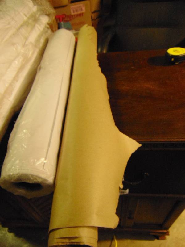 lot 1056 image: (2) rolls paper (1) white, 24 x 100, (1) brown kraft 31 x 100