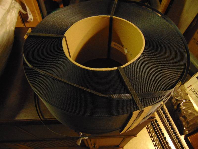 lot 1060 image: (1) roll black Polypropalene Strapping, 12 x 9900 x .024