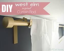 lot 1033 image: West Elm Over-sized Adjustable metal Rod 104-144, Gold Colored--finial and hardware not included