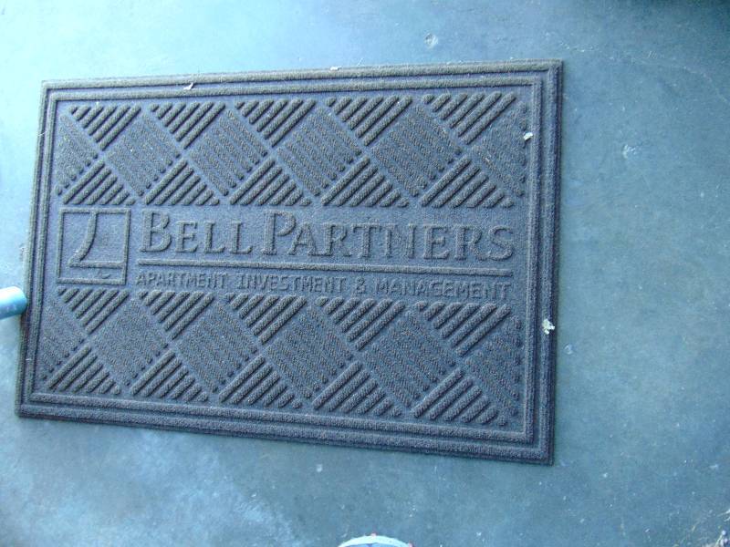 lot 1096 image: Rectangle Indoor Outdoor mat, 35 x 24, brown with rubber back, Bell Partners