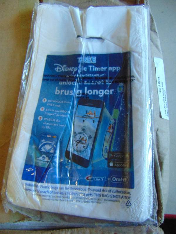 lot 1109 image: (1) case small plastic bags, 3600 per case kids patient bags, Disney Brushing App