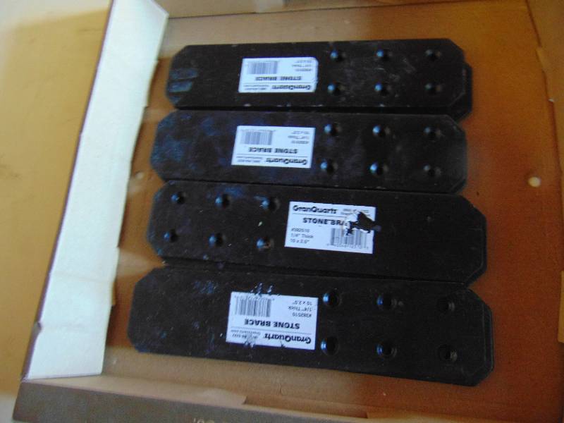 lot 1113 image: (8) ct. lot granite stone brace, 14 x 10 x 2.5