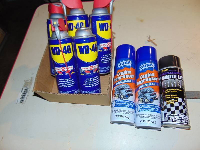 lot 1166 image: (8) ct. mixed lot (4-12) cans WD-40, (2) cans Engine de-greaser, (1) can white lithium grease