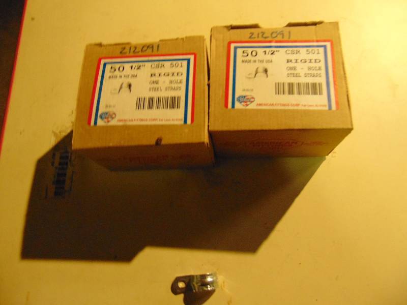 lot 1188 image: (2) boxes American Fittings Corp. Rigid One hole steel Straps, 12, 50 per box (2 x 50 100 straps total)