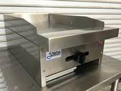 lot 1138 image: Propane Griddle base, griddle grate not included, 18 x 18 x 7 tall (stock photo is for reference only base is different than this picture)