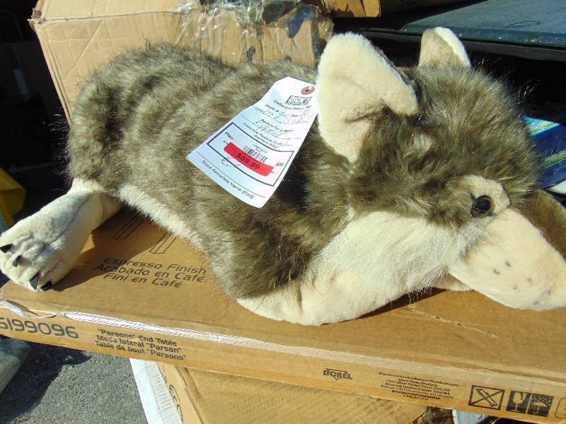 lot 1193 image: Jumbo Wolf Stuffed Animal Dicks Sporting Goods return, rip on the back (pictured)