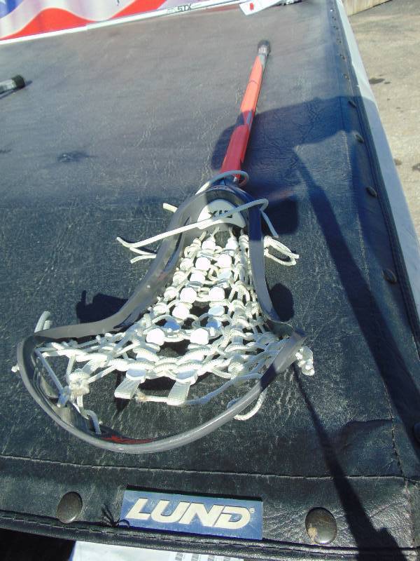 lot 1200 image: (1) Styx 7075 Lacrosse Stick, store return, ripped seam at the top of basket, will need to be re-strung
