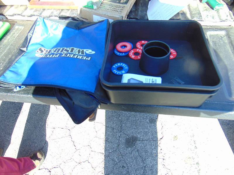 lot 1207 image: Perfect Pitch Washers Game, includes plastic target tubs, washers, instructions and carrying case