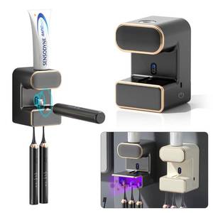 lot 10480 image: Toothpaste Dispenser for Kids with Toothbrush Holder, Electric Toothpaste Dispenser with Sensor, Toothpaste Squeezer, Toothpaste Dispenser Wall Mounted,(Functionality Unsure)