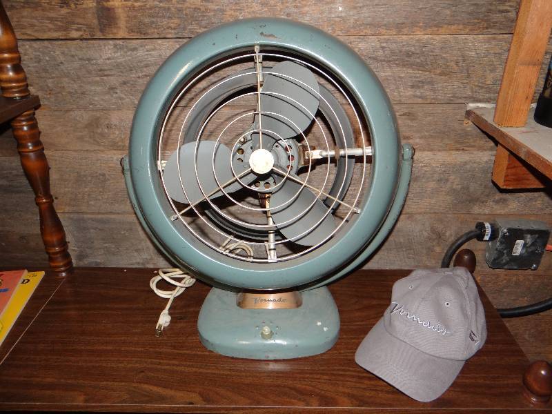 lot 742 image: Vintage Vornado fan & ball cap